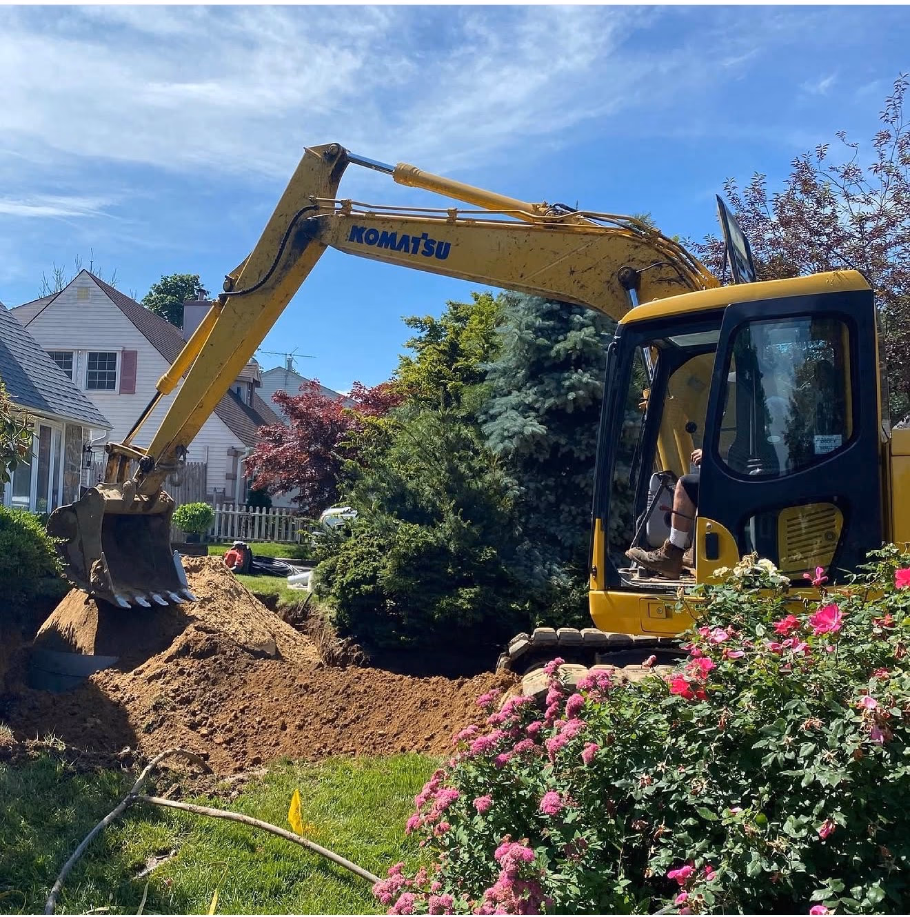 D.C. Crane Service — completed yard grading after septic install, Long Island NY